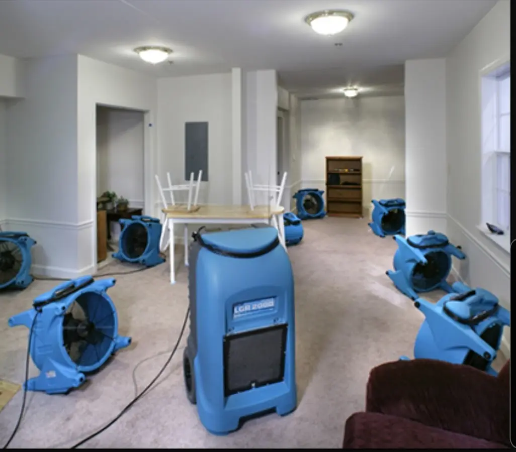 Air movers and dehumidifier setup for Water Extraction & Removal in Ocean Pointe